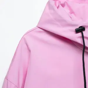 Regenjacke Damen Schlupfjacke mit Halbzip, Kapuze und Seitenzug – Bild 2